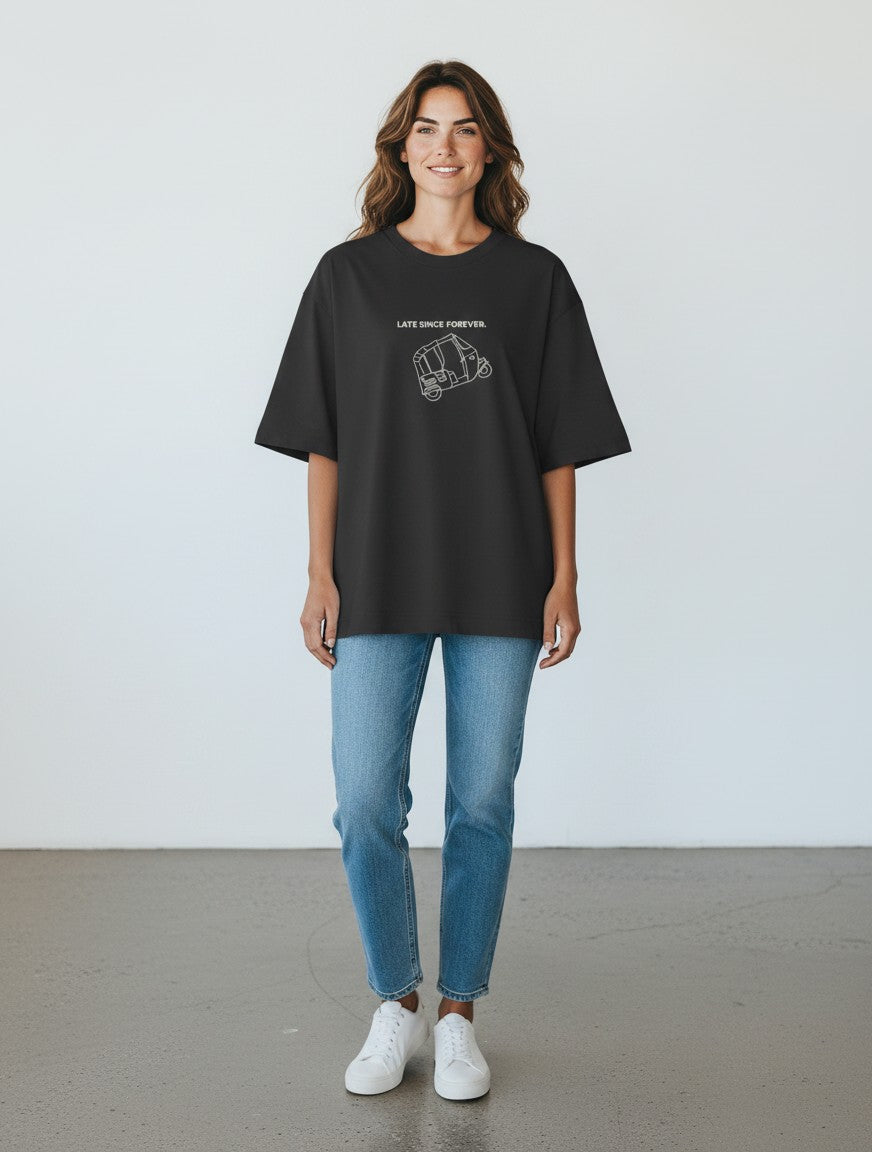 Woman wearing a black mi-DONE oversized cotton t-shirt with a white Late Since Forever rickshaw graphic print