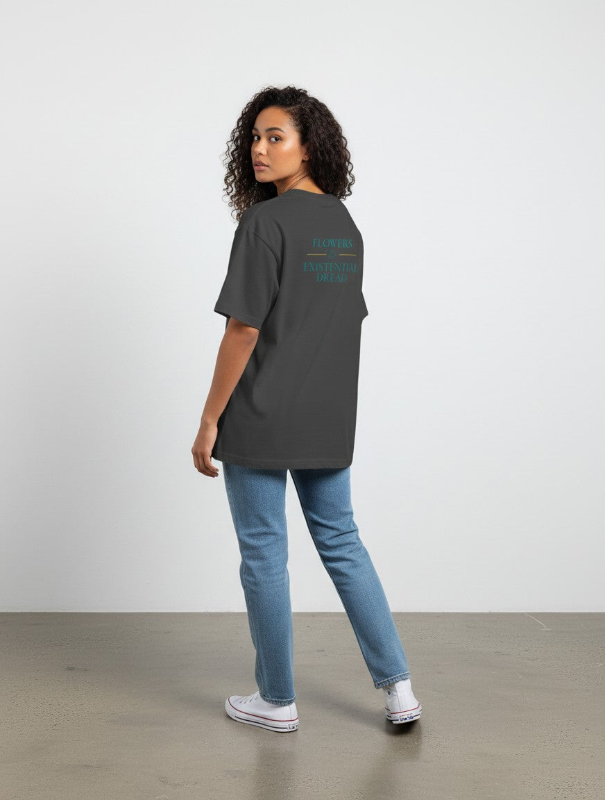 mi-DONE oversized charcoal grey cotton t-shirt with back graphic print worn by a woman with curly hair