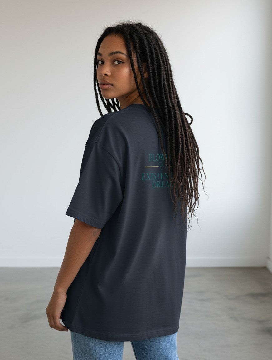 mi-DONE charcoal grey oversized cotton t-shirt with graphic print on back worn by a woman with long dreadlocks