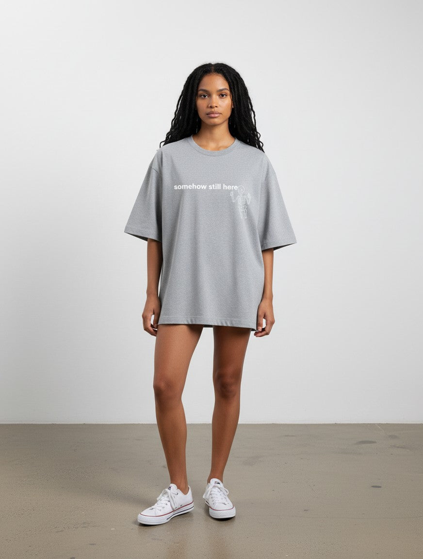 mi-DONE grey oversized cotton t-shirt with drop shoulders and white graphic print worn by a model