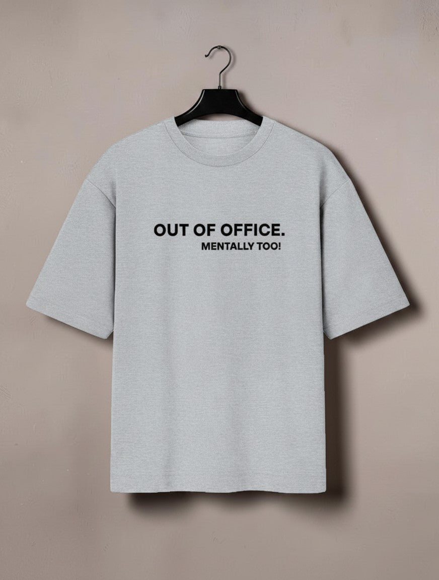 mi-DONE grey oversized cotton t-shirt with Out of Office Mentally Too text print hanging on a black hanger