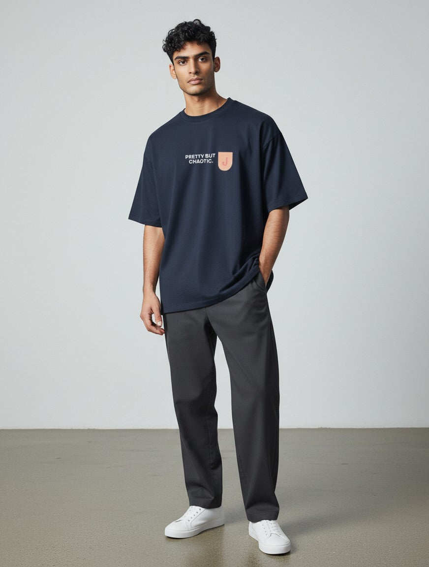 mi-DONE Jaipur oversized navy blue cotton t-shirt with graphic print on a male model wearing dark trousers