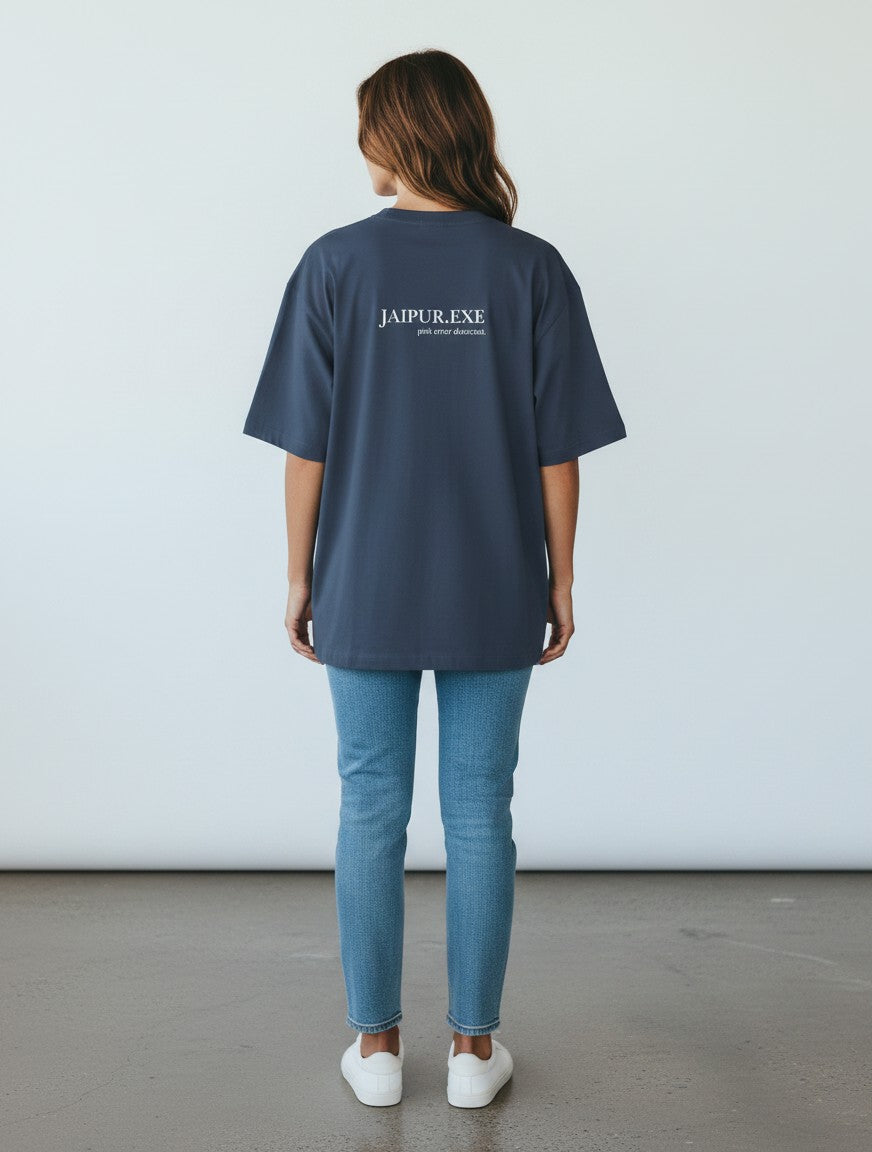 mi-DONE oversized blue cotton t-shirt with Jaipur graphic print on the back, worn by a woman with jeans