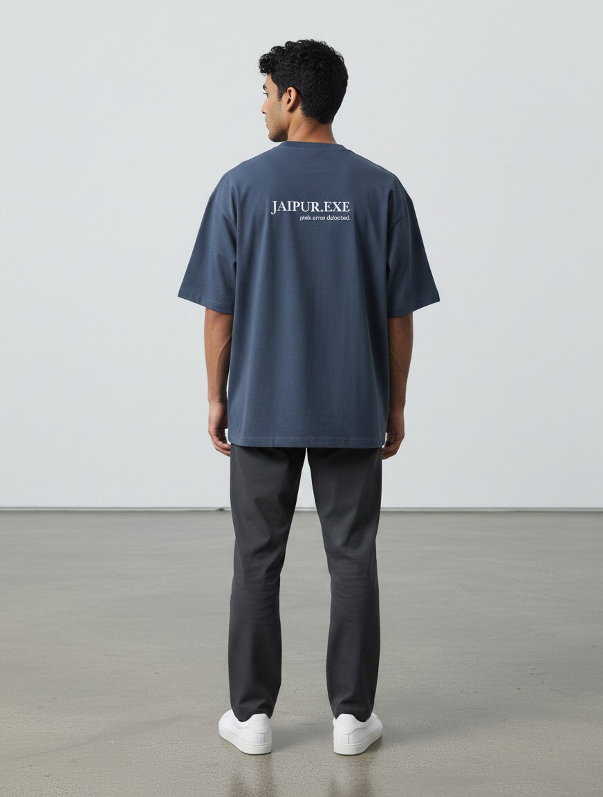 mi-DONE Jaipur oversized blue cotton t-shirt with back graphic print worn by a man against a plain background