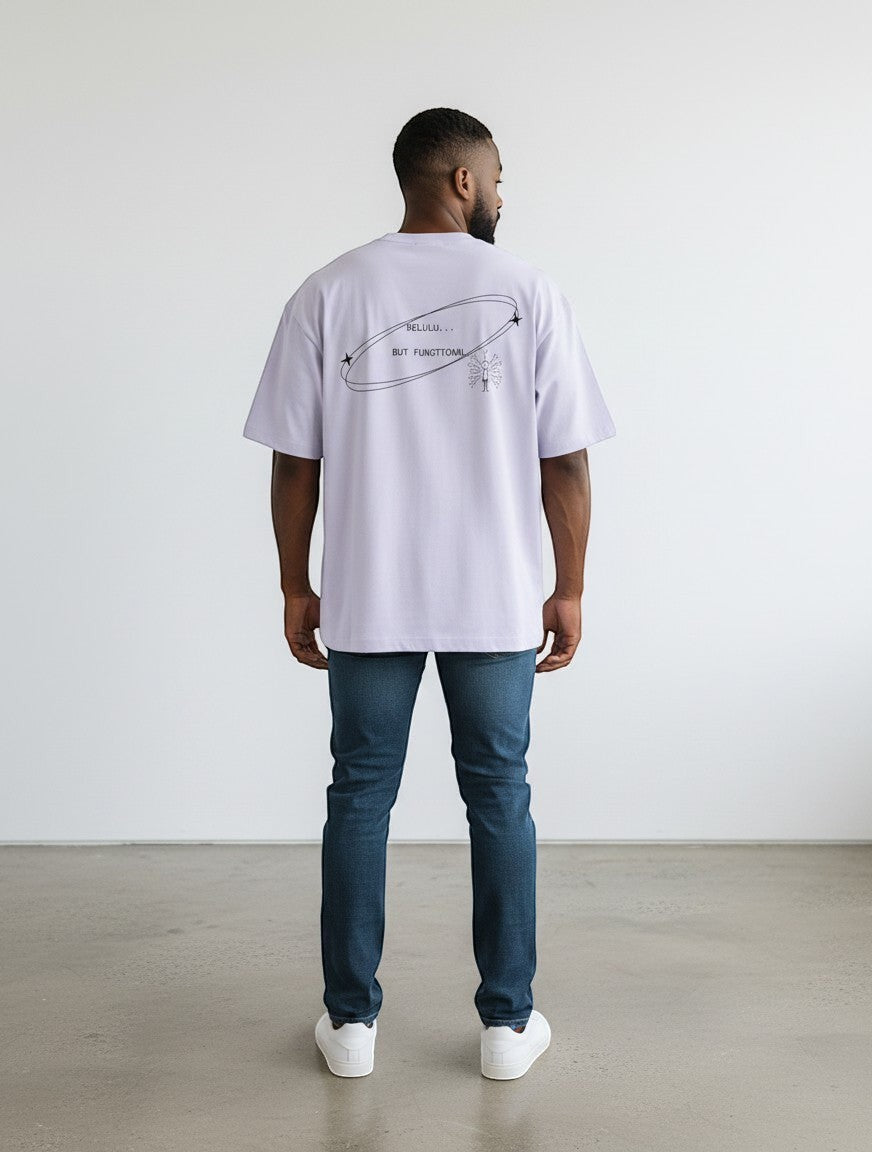 mi-DONE oversized lavender cotton t-shirt with Delulu But Functional graphic on the back worn by a man with jeans