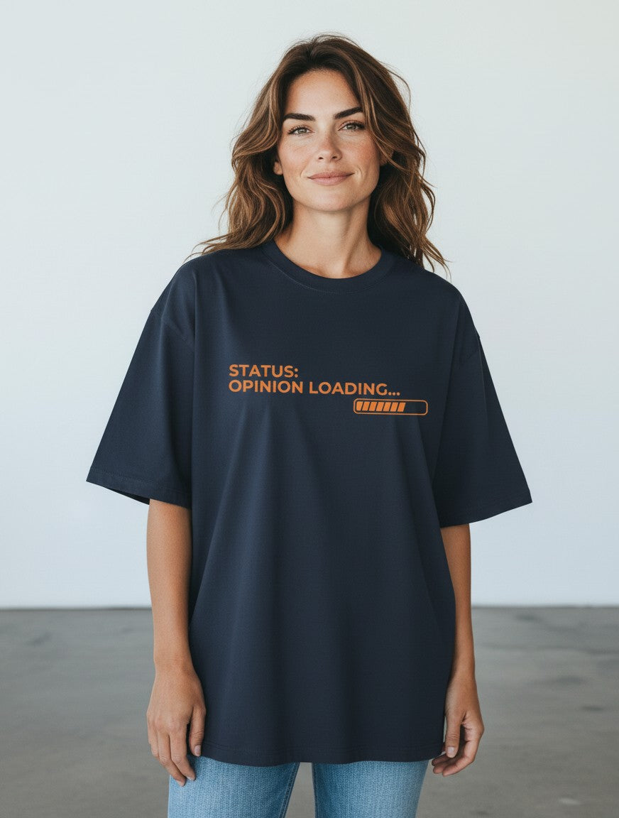 Woman wearing a navy blue mi-DONE oversized cotton t-shirt with orange Status Opinion Loading graphic print