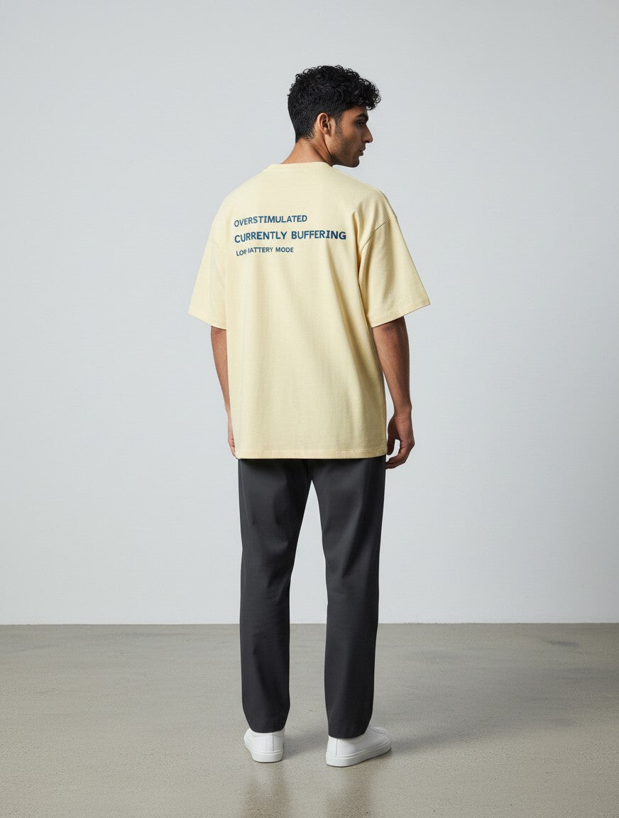 mi-DONE oversized cream cotton t-shirt with back print featuring text about being overstimulated and buffering