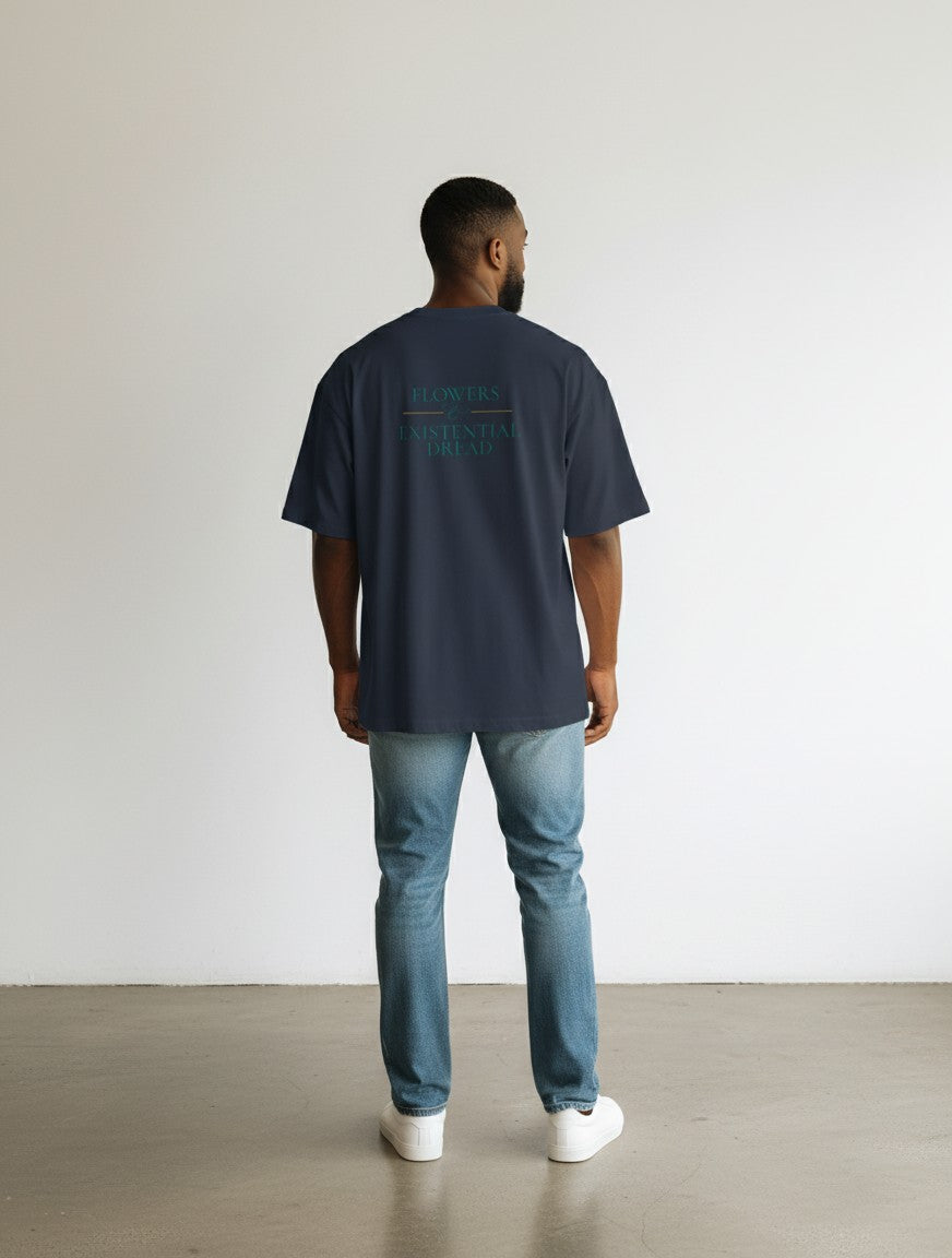 mi-DONE oversized navy blue cotton t-shirt with back graphic print worn by a man with jeans and white sneakers