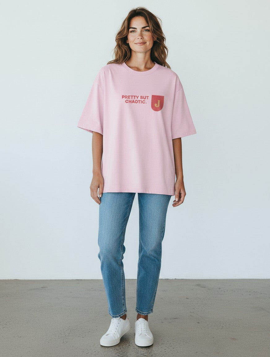 mi-DONE oversized pink cotton t-shirt with Pretty But Chaotic graphic print worn by a woman with blue jeans