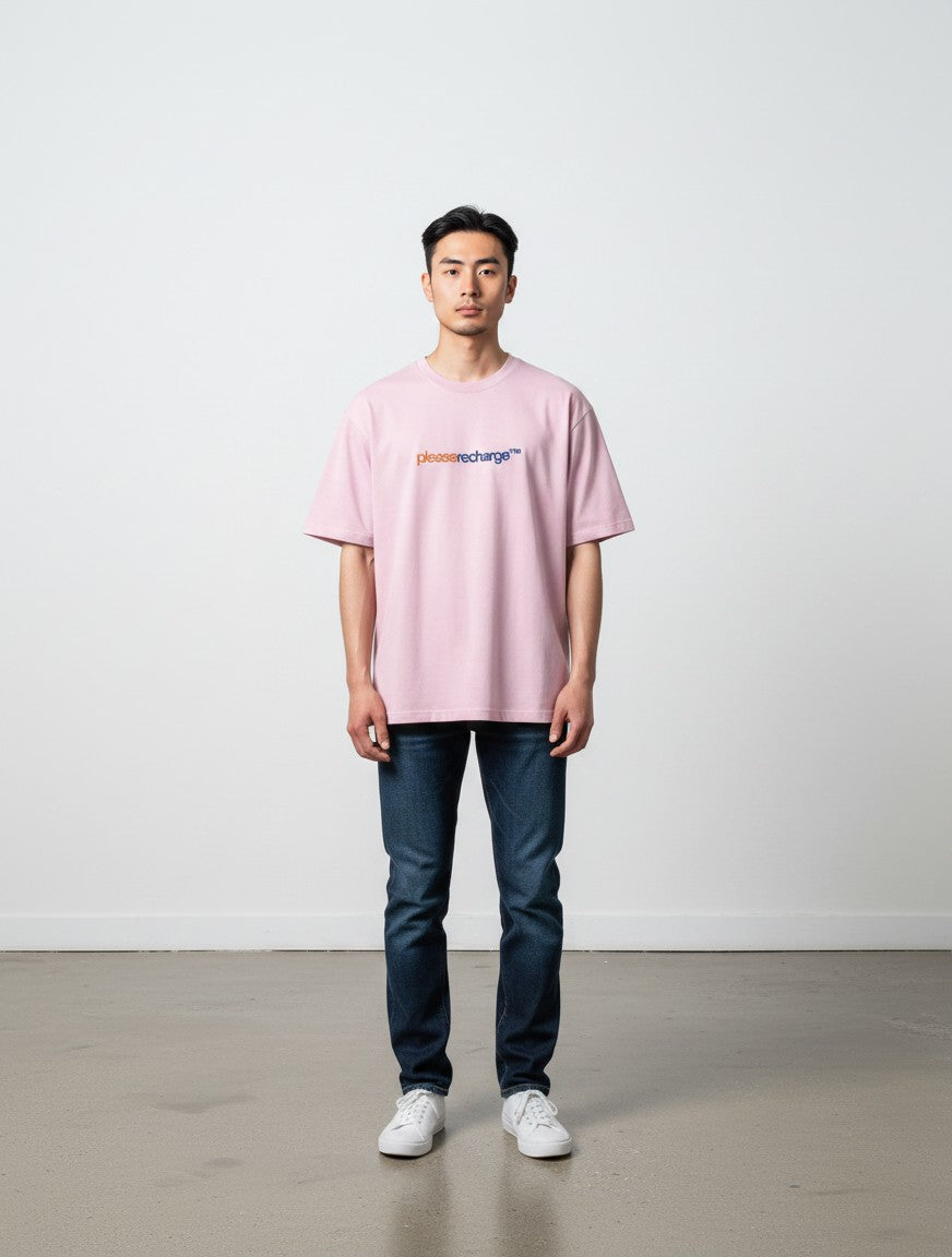 mi-DONE oversized light pink cotton t-shirt with drop shoulders and graphic print worn by a man with dark jeans