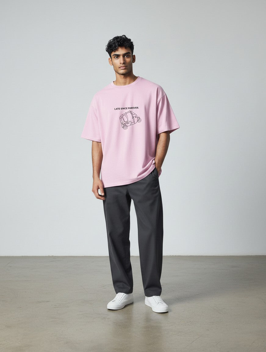 mi-DONE oversized pink cotton t-shirt with Mumbai rickshaw graphic print worn by a man with dark trousers