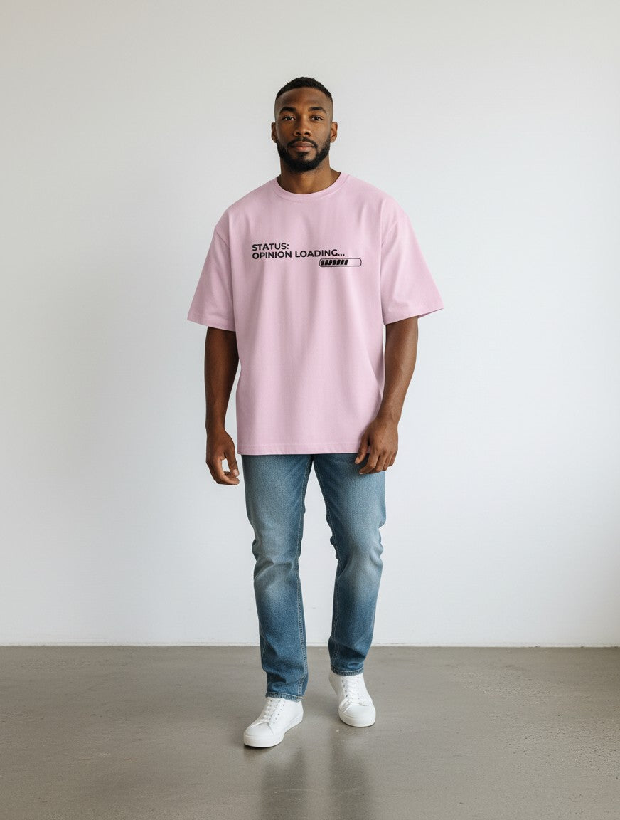 mi-DONE oversized pink cotton t-shirt with Opinion Loading graphic print worn by a man with blue jeans