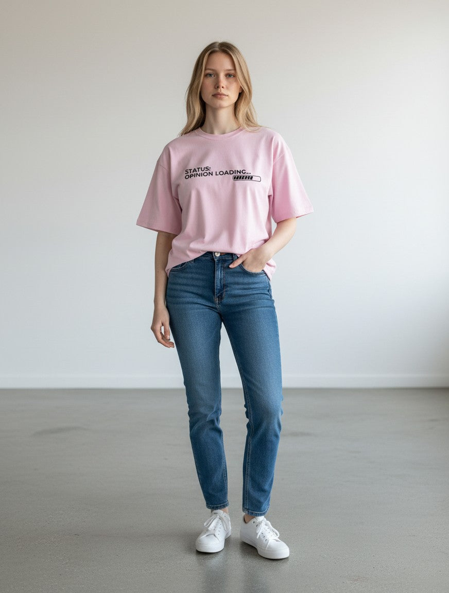 mi-DONE oversized pink cotton t-shirt with Opinion Loading graphic print worn by a woman with blue jeans