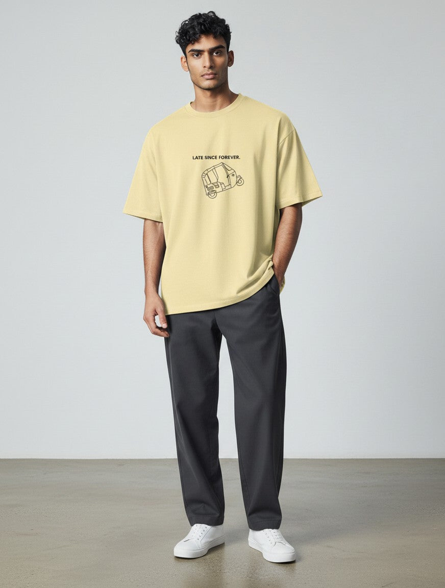 mi-DONE oversized yellow cotton t-shirt with Mumbai rickshaw graphic print worn by a man with dark trousers