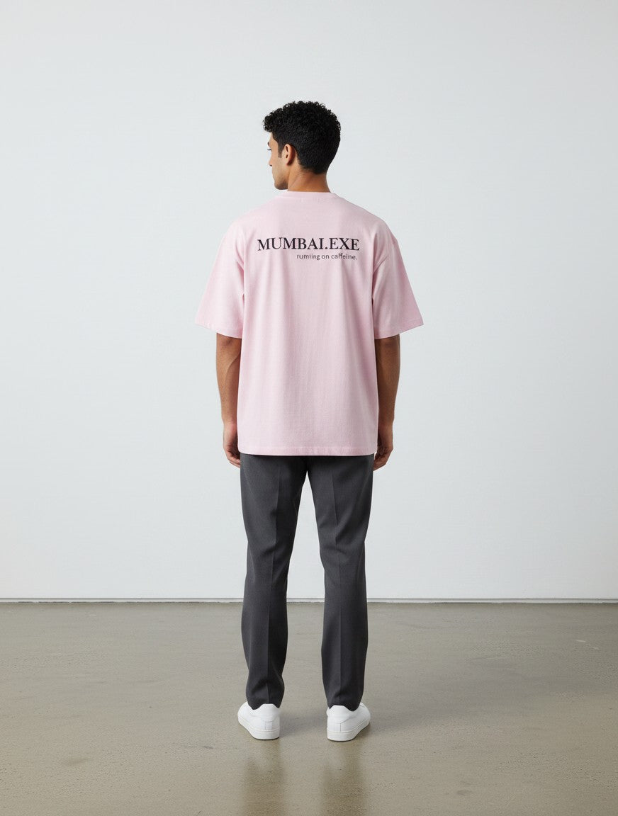 mi-DONE oversized pink cotton t-shirt with Mumbai graphic print on the back worn by a man from behind