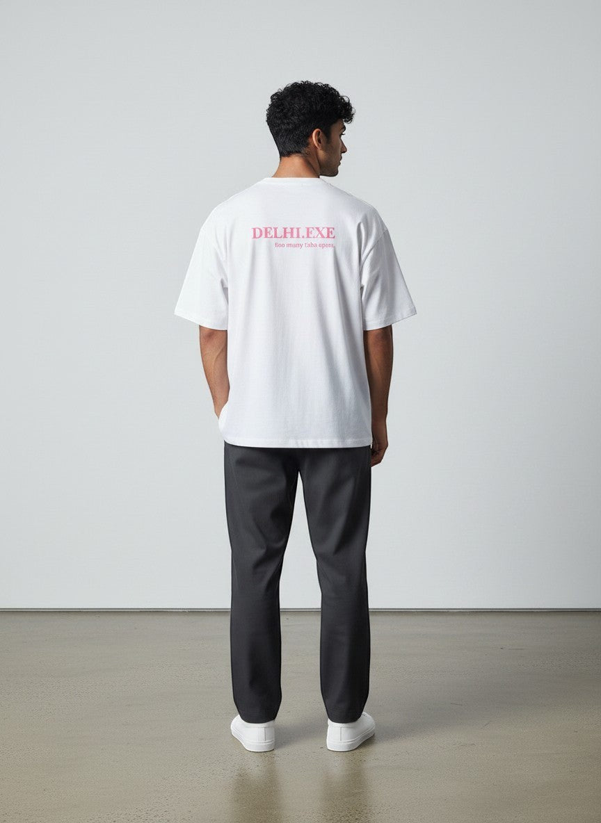 mi-DONE white oversized cotton t-shirt with Delhi.exe pink back print worn by a man with dark trousers