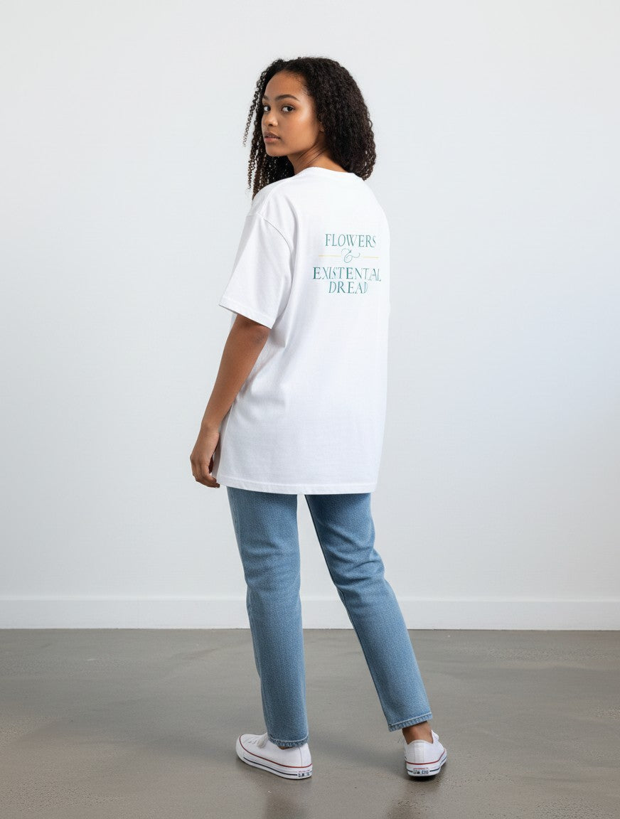mi-DONE white oversized cotton t-shirt with back graphic print worn by a woman with jeans