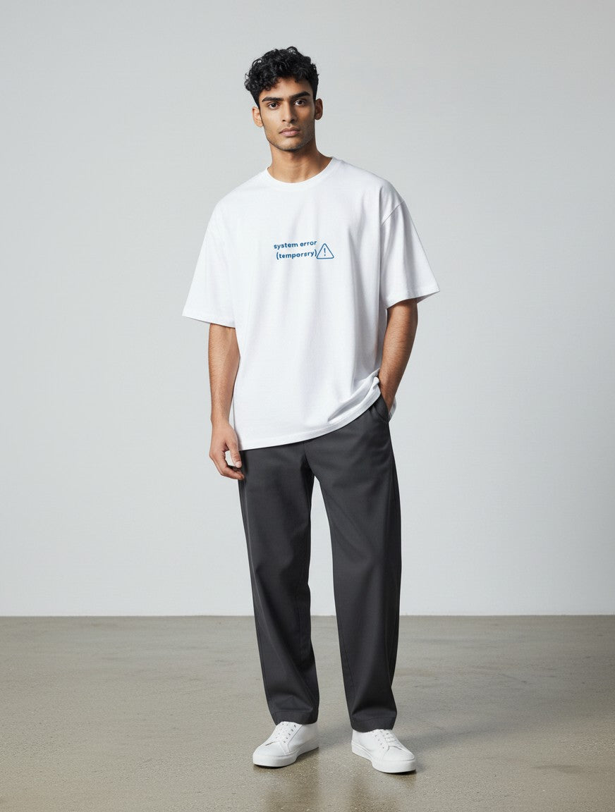 mi-DONE white oversized cotton t-shirt with System Error graphic print worn by a male model with dark trousers